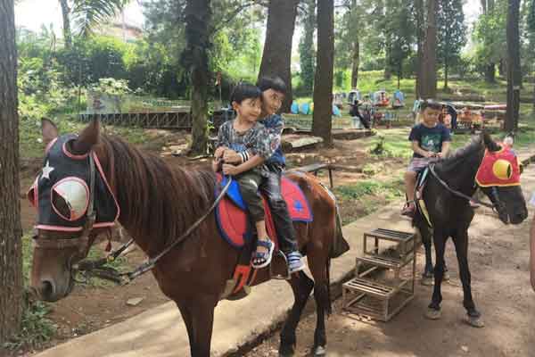 jam buka woodland kuningan